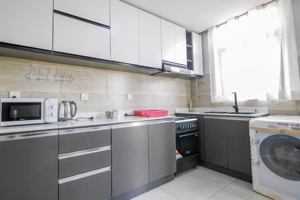 Ultra Modern Apartment In Nyarutarama Кигали Экстерьер фото